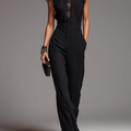 Blusa Nera in Chiffon con Maniche Ruffle e Set di Pantaloni a Vita Alta e Gamba Larga